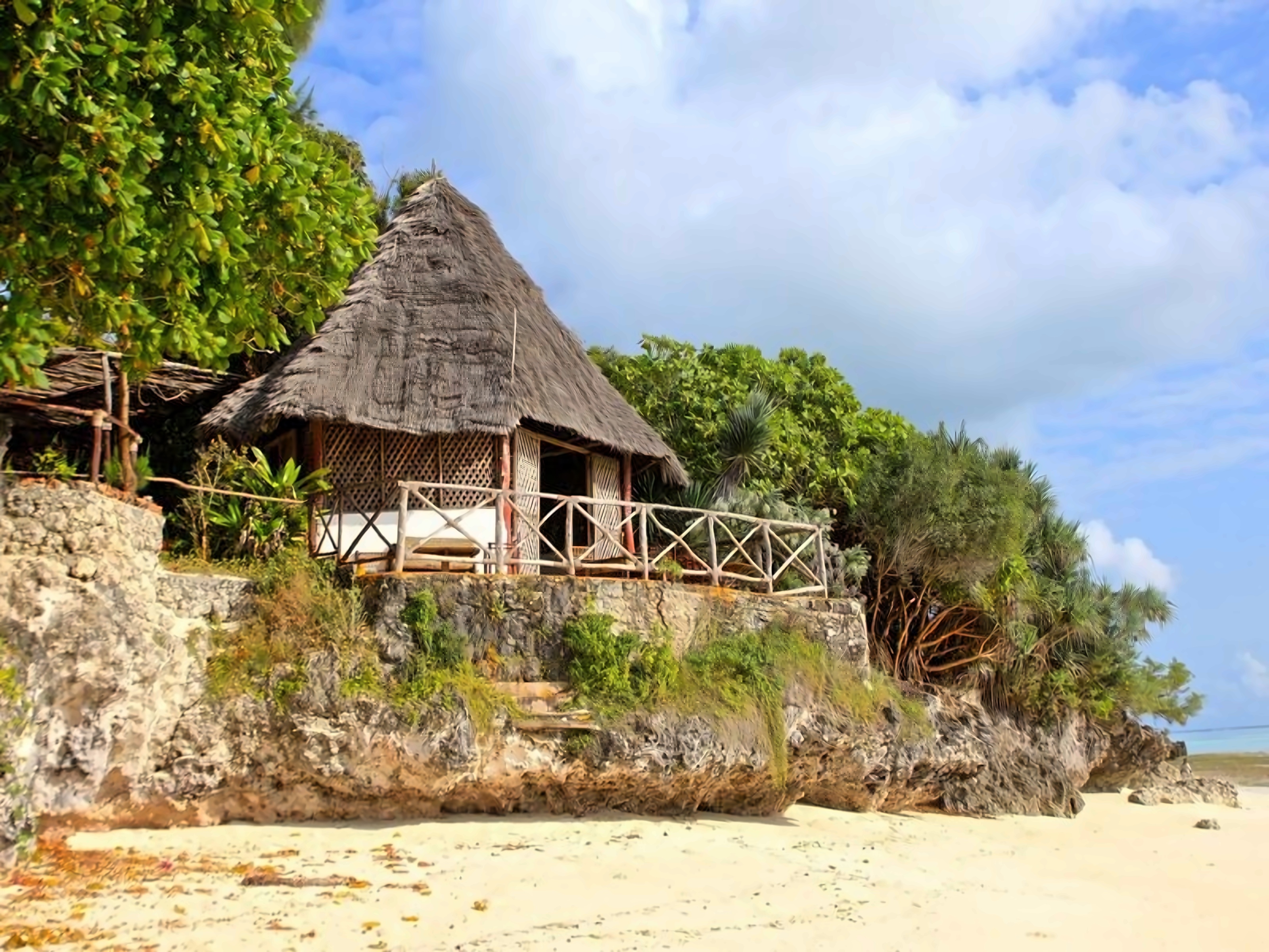 Уроа занзибар. Занзибар отели. Бунгало арк. Танзания дома. Жилища танзании.